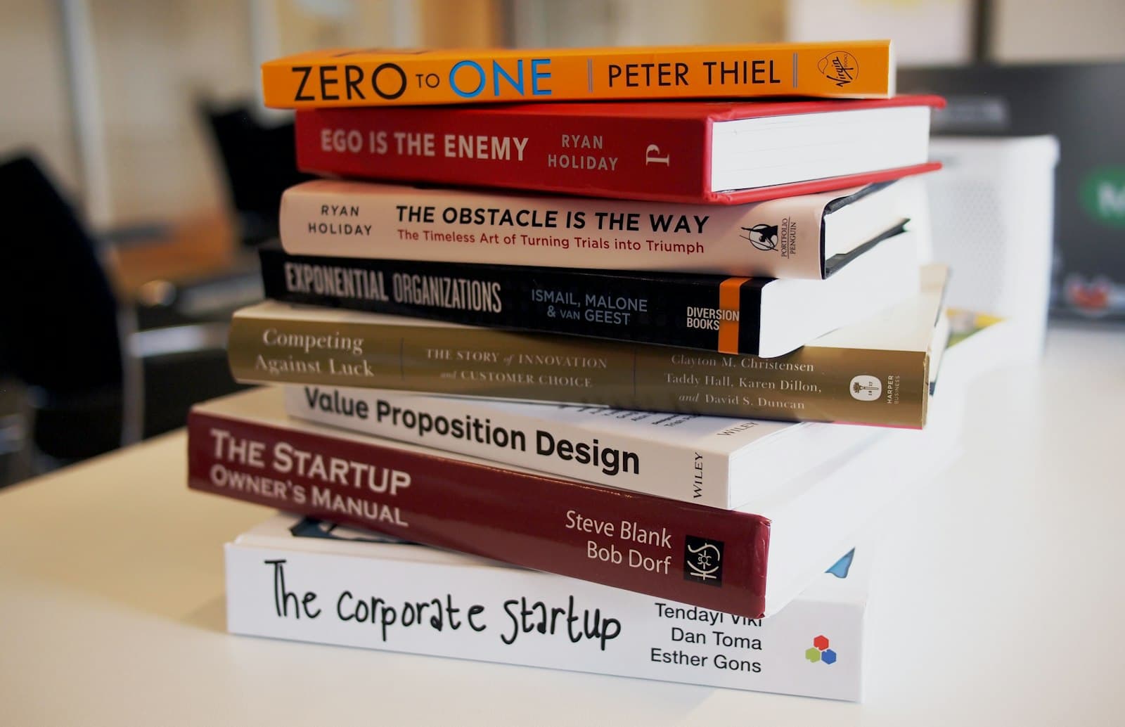 Open study books and notes on a wooden desk